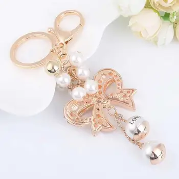 Nova moda ustvarjalne kristalno lok keychain ljubezen pearl avto ključ obroč ženska torba obesek pribor čar nakit darilo ključnih verige